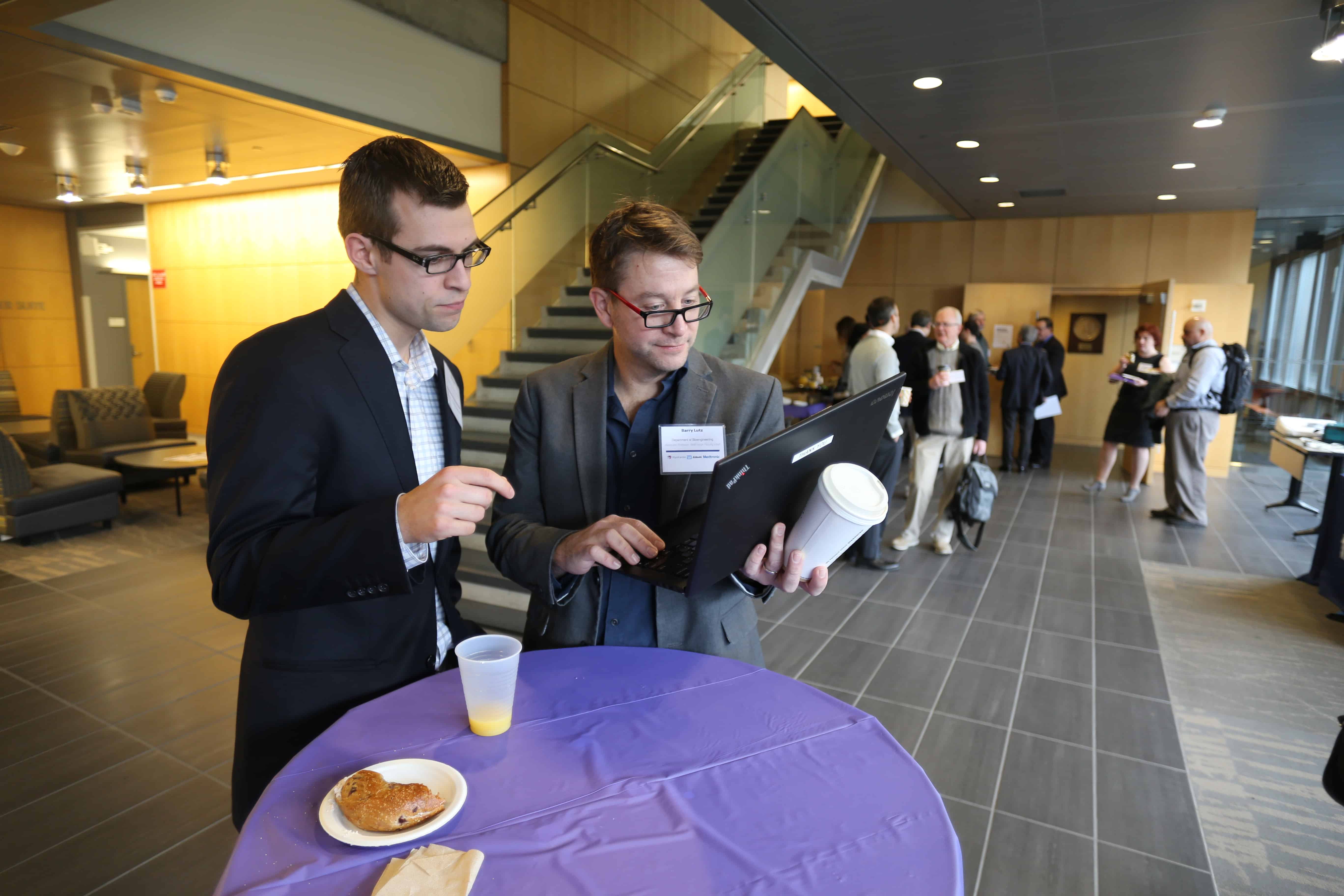 Researchers at a symposium reception