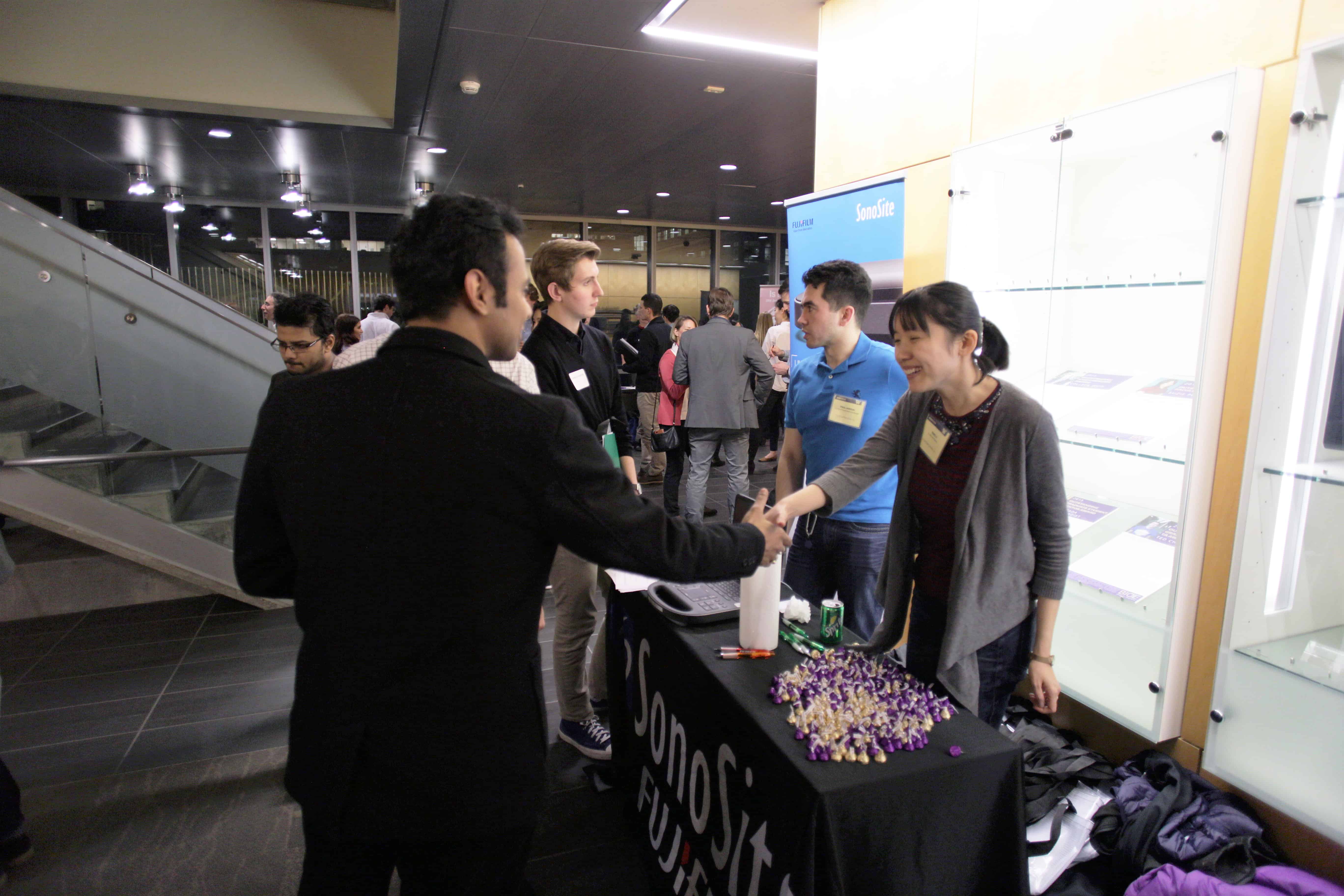 Researchers networking at an event